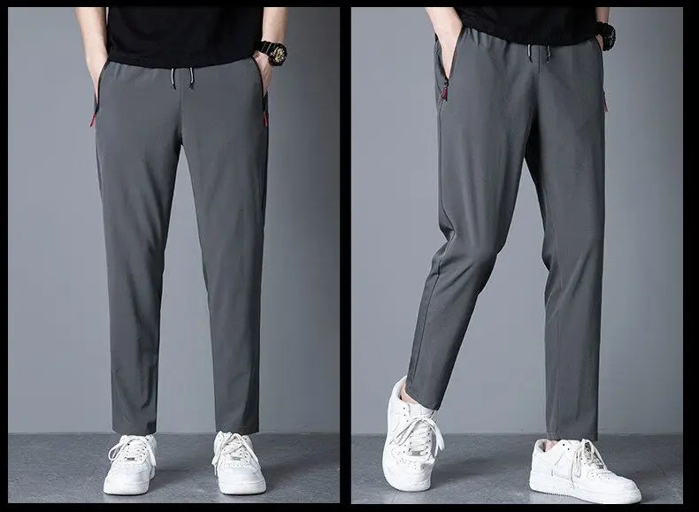 Men's casual pants straight leg slim fit elastic waist jogging pants Korean classic blue black gray men's pants plus size 4XL5XL