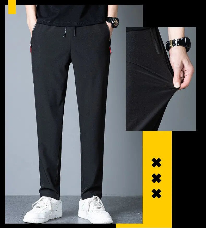 Men's casual pants straight leg slim fit elastic waist jogging pants Korean classic blue black gray men's pants plus size 4XL5XL