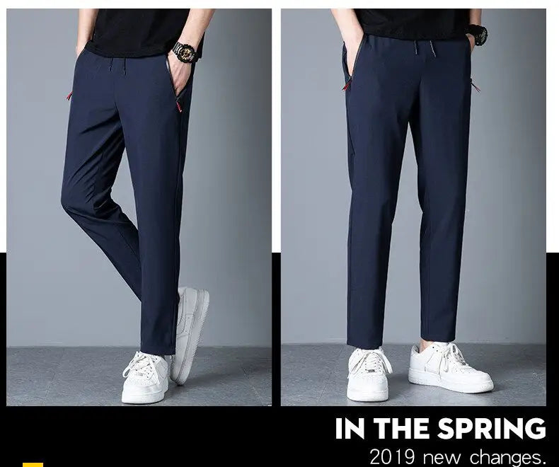 Men's casual pants straight leg slim fit elastic waist jogging pants Korean classic blue black gray men's pants plus size 4XL5XL